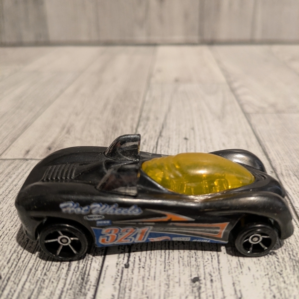 Hot Wheels Black Convertible Toy Car with Yellow Canopy